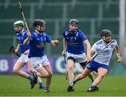 22 April 2023; Niall Garland of Monaghan in action against Cillian Sheanon, left, and Jack Barry of Cavan during the Lory Meagher Cup Round 2 match between Cavan and Monaghan at Kingspan Breffni in Cavan. Photo by Stephen McCarthy/Sportsfile