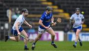 22 April 2023; Nicky Kenny of Cavan in action against Jack Guinan of Monaghan during the Lory Meagher Cup Round 2 match between Cavan and Monaghan at Kingspan Breffni in Cavan. Photo by Stephen McCarthy/Sportsfile