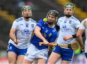 22 April 2023; Cillian Sheanon of Cavan in action against Kevin Crawley, left, and Stephen Lambe of Monaghan during the Lory Meagher Cup Round 2 match between Cavan and Monaghan at Kingspan Breffni in Cavan. Photo by Stephen McCarthy/Sportsfile