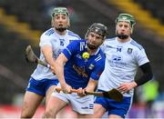 22 April 2023; Cillian Sheanon of Cavan in action against Kevin Crawley, left, and Stephen Lambe of Monaghan during the Lory Meagher Cup Round 2 match between Cavan and Monaghan at Kingspan Breffni in Cavan. Photo by Stephen McCarthy/Sportsfile