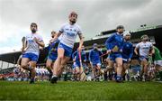 23 April 2023; Calum Lyons, 5, and his Waterford team-mates break from their team photograph before the Munster GAA Hurling Senior Championship Round 1 match between Waterford and Limerick at FBD Semple Stadium in Thurles, Tipperary. Photo by Stephen McCarthy/Sportsfile