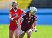 23 April 2023; Ciara McGrath of Galway in action against Caoimhe O'Donoghue of Cork during the Electric Ireland Camogie Minor A Semi-Final match between Cork and Galway at McDonagh Park in Nenagh, Tipperary. Photo by Stephen Marken/Sportsfile