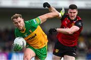 23 April 2023; Stephen McMenamin of Donegal in action against Niall McParland of Down during the Ulster GAA Football Senior Championship Quarter-Final match between Down and Donegal at Pairc Esler in Newry, Down. Photo by Ramsey Cardy/Sportsfile