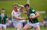 23 April 2023; John Heslin of Westmeath in action against Donal McKenny of Louth during the Leinster GAA Football Senior Championship Quarter-Final match between Westmeath and Louth at Páirc Tailteann in Navan, Meath. Photo by Daire Brennan/Sportsfile