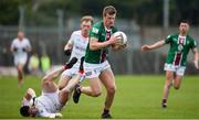 23 April 2023; John Heslin of Westmeath in action against Dan Corcoran of Louth during the Leinster GAA Football Senior Championship Quarter-Final match between Westmeath and Louth at Páirc Tailteann in Navan, Meath. Photo by Daire Brennan/Sportsfile