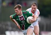 23 April 2023; John Heslin of Westmeath in action against Conor Early of Louth during the Leinster GAA Football Senior Championship Quarter-Final match between Westmeath and Louth at Páirc Tailteann in Navan, Meath. Photo by Daire Brennan/Sportsfile