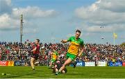 23 April 2023; Jason McGee of Donegal celebrates after scoring his side's first goal during the Ulster GAA Football Senior Championship Quarter-Final match between Down and Donegal at Pairc Esler in Newry, Down. Photo by Ramsey Cardy/Sportsfile