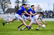 23 April 2023; Jack Robinson of Kildare is tackled by Cillian McDonald of Wicklow, left, and Malachy Stone during the Leinster GAA Football Senior Championship Quarter-Final match between Kildare and Wicklow at Netwatch Cullen Park in Carlow. Photo by Tyler Miller/Sportsfile