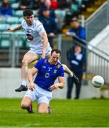 23 April 2023; Jack Robinson of Kildare has his shot blocked by Paul McLoughlin of Wicklow during the Leinster GAA Football Senior Championship Quarter-Final match between Kildare and Wicklow at Netwatch Cullen Park in Carlow. Photo by Tyler Miller/Sportsfile