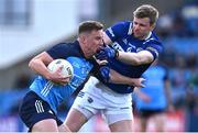 23 April 2023; Ciarán Kilkenny of Dublin is tackled by Mark Timmons of Laois during the Leinster GAA Football Senior Championship Quarter-Final match between Laois and Dublin at Laois Hire O'Moore Park in Portlaoise, Laois. Photo by Brendan Moran/Sportsfile