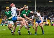 23 April 2023; Calum Lyons, left, and Darragh Lyons of Waterford in action against Cian Lynch of Limerick during the Munster GAA Hurling Senior Championship Round 1 match between Waterford and Limerick at FBD Semple Stadium in Thurles, Tipperary. Photo by Stephen McCarthy/Sportsfile