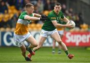 23 April 2023; Michael Flood of Meath in action against Peter Cunningham of Offaly during the Leinster GAA Football Senior Championship Quarter-Final match between Offaly and Meath at Glenisk O'Connor Park in Tullamore, Offaly. Photo by Eóin Noonan/Sportsfile