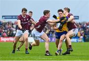 23 April 2023; Ben O’Carroll of Roscommon in action against Jack Glynn, left, and Johnny McGrath of Galway during the Connacht GAA Football Senior Championship Semi-Final match between Roscommon and Galway at Dr Hyde Park in Roscommon. Photo by Seb Daly/Sportsfile