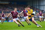 23 April 2023; Ben O’Carroll of Roscommon in action against Jack Glynn of Galway during the Connacht GAA Football Senior Championship Semi-Final match between Roscommon and Galway at Dr Hyde Park in Roscommon. Photo by Seb Daly/Sportsfile