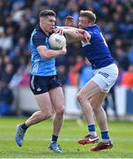 23 April 2023; Lee Gannon of Dublin in action against Kieran Lillis of Laois during the Leinster GAA Football Senior Championship Quarter-Final match between Laois and Dublin at Laois Hire O'Moore Park in Portlaoise, Laois. Photo by Brendan Moran/Sportsfile
