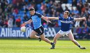 23 April 2023; Lee Gannon of Dublin in action against Paul Kingston of Laois during the Leinster GAA Football Senior Championship Quarter-Final match between Laois and Dublin at Laois Hire O'Moore Park in Portlaoise, Laois. Photo by Brendan Moran/Sportsfile