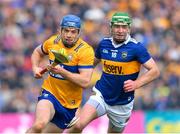 23 April 2023; Shane O'Donnell of Clare  in action against Noel McGrath of Tipperary  during the Munster GAA Hurling Senior Championship Round 1 match between Clare and Tipperary at Cusack Park in Ennis, Clare. Photo by Ray McManus/Sportsfile