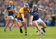 23 April 2023; Diarmuid Ryan of Clare in action against Alan Tynan of Tipperary during the Munster GAA Hurling Senior Championship Round 1 match between Clare and Tipperary at Cusack Park in Ennis, Clare. Photo by John Sheridan/Sportsfile.