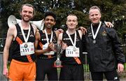 23 April 2023; The Clonliffe Harriers senior men's team, from left, Jayme Rossiter, Efrem Gidey, Stephen Cashin and Eoin Pierce, with the cup after winning the senior men's event during the 123.ie National Road Relay Championships at Raheny in Dublin. Photo by Sam Barnes/Sportsfile