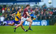 23 April 2023; John Daly of Galway in action against Donie Smith of Roscommon during the Connacht GAA Football Senior Championship Semi-Final match between Roscommon and Galway at Dr Hyde Park in Roscommon. Photo by Seb Daly/Sportsfile