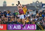 23 April 2023; Johnny McGrath of Galway in action against Dylan Ruane of Roscommon during the Connacht GAA Football Senior Championship Semi-Final match between Roscommon and Galway at Dr Hyde Park in Roscommon. Photo by Seb Daly/Sportsfile