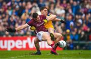 23 April 2023; Damien Comer of Galway scores his side's first goal, despite the tackle of Roscommon's David Murray, during the Connacht GAA Football Senior Championship Semi-Final match between Roscommon and Galway at Dr Hyde Park in Roscommon. Photo by Seb Daly/Sportsfile