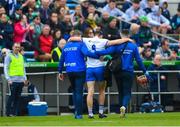 23 April 2023; Tadhg de Burca of Waterford leaves the pitch to receive medical attention during the Munster GAA Hurling Senior Championship Round 1 match between Waterford and Limerick at FBD Semple Stadium in Thurles, Tipperary. Photo by Stephen McCarthy/Sportsfile