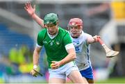 23 April 2023; William O'Donoghue of Limerick in action against Calum Lyons of Waterford during the Munster GAA Hurling Senior Championship Round 1 match between Waterford and Limerick at FBD Semple Stadium in Thurles, Tipperary. Photo by Stephen McCarthy/Sportsfile