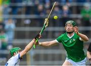 23 April 2023; William O'Donoghue of Limerick in action against Tom Barron of Waterford during the Munster GAA Hurling Senior Championship Round 1 match between Waterford and Limerick at FBD Semple Stadium in Thurles, Tipperary. Photo by Stephen McCarthy/Sportsfile