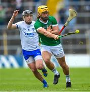 23 April 2023; Tom Morrissey of Limerick in action against Darragh Lyons of Waterford during the Munster GAA Hurling Senior Championship Round 1 match between Waterford and Limerick at FBD Semple Stadium in Thurles, Tipperary. Photo by Stephen McCarthy/Sportsfile