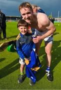 23 April 2023; Noel McGrath of Tipperary with a cousin, Orin White, six years, who he presented his jersey to after the Munster GAA Hurling Senior Championship Round 1 match between Clare and Tipperary at Cusack Park in Ennis, Clare. Photo by Ray McManus/Sportsfile