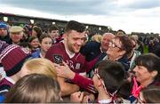 23 April 2023; Damien Comer of Galway with supporters after their side's victory in the Connacht GAA Football Senior Championship Semi-Final match between Roscommon and Galway at Dr Hyde Park in Roscommon. Photo by Seb Daly/Sportsfile