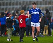 23 April 2023; Padraig Kirwan of Laois is consoled by a supporter as he leaves the pitch after the Leinster GAA Football Senior Championship Quarter-Final match between Laois and Dublin at Laois Hire O'Moore Park in Portlaoise, Laois. Photo by Brendan Moran/Sportsfile
