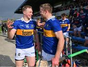 23 April 2023; Brian McGrath and Noel McGrath of Tipperary celebrate at the final whistle of the Munster GAA Hurling Senior Championship Round 1 match between Clare and Tipperary at Cusack Park in Ennis, Clare. Photo by Ray McManus/Sportsfile