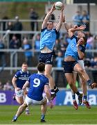 23 April 2023; Brian Fenton of Dublin catches a kickout ahead of teammate Brian Howard and Kieran Lillis of Laois during the Leinster GAA Football Senior Championship Quarter-Final match between Laois and Dublin at Laois Hire O'Moore Park in Portlaoise, Laois. Photo by Brendan Moran/Sportsfile