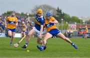 23 April 2023; Jake Morris of Tipperary is tackled by Rory Hayes of Clare during the Munster GAA Hurling Senior Championship Round 1 match between Clare and Tipperary at Cusack Park in Ennis, Clare. Photo by Ray McManus/Sportsfile