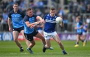 23 April 2023; Trevor Collins of Laois is tackled by Ciarán Kilkenny of Dublin during the Leinster GAA Football Senior Championship Quarter-Final match between Laois and Dublin at Laois Hire O'Moore Park in Portlaoise, Laois. Photo by Brendan Moran/Sportsfile