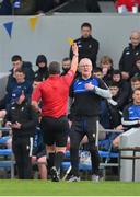23 April 2023; Referee Thomas Walsh issues a yellow card to Clare manager Brian Lohan during the Munster GAA Hurling Senior Championship Round 1 match between Clare and Tipperary at Cusack Park in Ennis, Clare. Photo by Ray McManus/Sportsfile