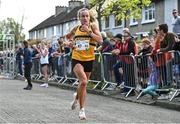 23 April 2023; Michelle Finn of Leevale AC, Cork, competes in the senior women's event during the 123.ie National Road Relay Championships at Raheny in Dublin. Photo by Sam Barnes/Sportsfile