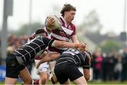 23 April 2023; Conor Duffy of Tullow RFC is tackled by Jake McDonald and Podge Mahon of Kilkenny RFC during Bank of Ireland Provincial Towns Cup Final between Tullow RFC and Kilkenny RFC at Athy Rugby Football Club in Kildare. Photo by Matt Browne/Sportsfile