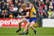 23 April 2023; Peter Cooke of Galway in action against Dylan Ruane of Roscommon during the Connacht GAA Football Senior Championship Semi-Final match between Roscommon and Galway at Dr Hyde Park in Roscommon. Photo by Seb Daly/Sportsfile