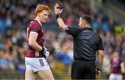 23 April 2023; Peter Cooke of Galway and referee David Gough during the Connacht GAA Football Senior Championship Semi-Final match between Roscommon and Galway at Dr Hyde Park in Roscommon. Photo by Seb Daly/Sportsfile