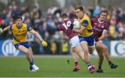 23 April 2023; Enda Smith of Roscommon in action against John Maher of Galway, right, during the Connacht GAA Football Senior Championship Semi-Final match between Roscommon and Galway at Dr Hyde Park in Roscommon. Photo by Seb Daly/Sportsfile