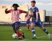 24 April 2023; Darren Nwankwo of Treaty United in action against Barry Baggley of Waterford during the SSE Airtricity Men's First Division match between Treaty United and Waterford at Markets Field in Limerick. Photo by Michael P Ryan/Sportsfile