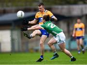 22 April 2023; Ciaran Russell of Clare in action against Peter Nash of Limerick during the Munster GAA Football Senior Championship Semi-Final match between Limerick and Clare at TUS Gaelic Grounds in Limerick. Photo by Tom Beary/Sportsfile