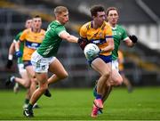 22 April 2023; Manus Doherty of Clare is tackled by Jim Liston of Limerick during the Munster GAA Football Senior Championship Semi-Final match between Limerick and Clare at TUS Gaelic Grounds in Limerick. Photo by Tom Beary/Sportsfile