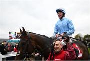 25 April 2023; Jockey Donagh Meyler celebrates on Feronily after winning winning the Dooley Insurance Group Champion Novice Steeplechase during day one of the Punchestown Festival at Punchestown Racecourse in Kildare. Photo by Harry Murphy/Sportsfile
