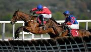 26 April 2023; Grangeclare West, left, with Paul Townend up, jumps the last on their way to winning the Louis Fitzgerald Hotel Hurdle, from eventual second place Da Capo Glory, right, with Darragh Allen up, during day two of the Punchestown Festival at Punchestown Racecourse in Kildare. Photo by Seb Daly/Sportsfile