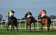 26 April 2023; Fastorslow, centre, with JJ Slevin up, on their way to winning the Ladbrokes Punchestown Gold Cup, from eventual second place Galopin Des Champs, left, Paul Townend up, and third place Bravemansgame, right, with Harry Cobden up, during day two of the Punchestown Festival at Punchestown Racecourse in Kildare. Photo by Seb Daly/Sportsfile