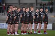 26 April 2023; Down players stand for Amhrán na bhFiann before the 2023 EirGrid Ulster U20 Football Championship Final match between Derry and Down at BOX-IT Athletic Grounds in Armagh. Photo by Ben McShane/Sportsfile
